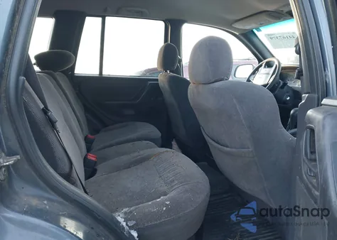 2001 Jeep Grand Cherokee Laredo z USA, uszkodzony, nr VIN 1J4GW48S11C718404